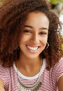 closeup of young woman smiling 