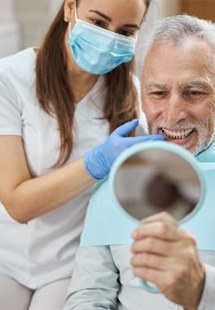 man smiling during checkup 