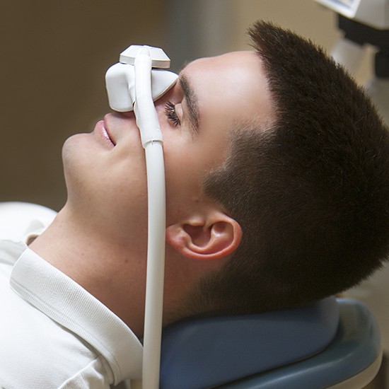 man with nitrous mask on