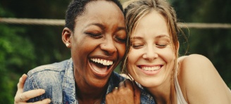 two friends smiling together