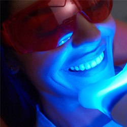 Light being shined on the teeth