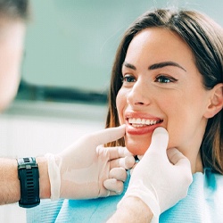 patient smiling after getting veneers in Grand Island