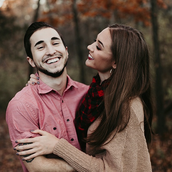 young couple smiling together